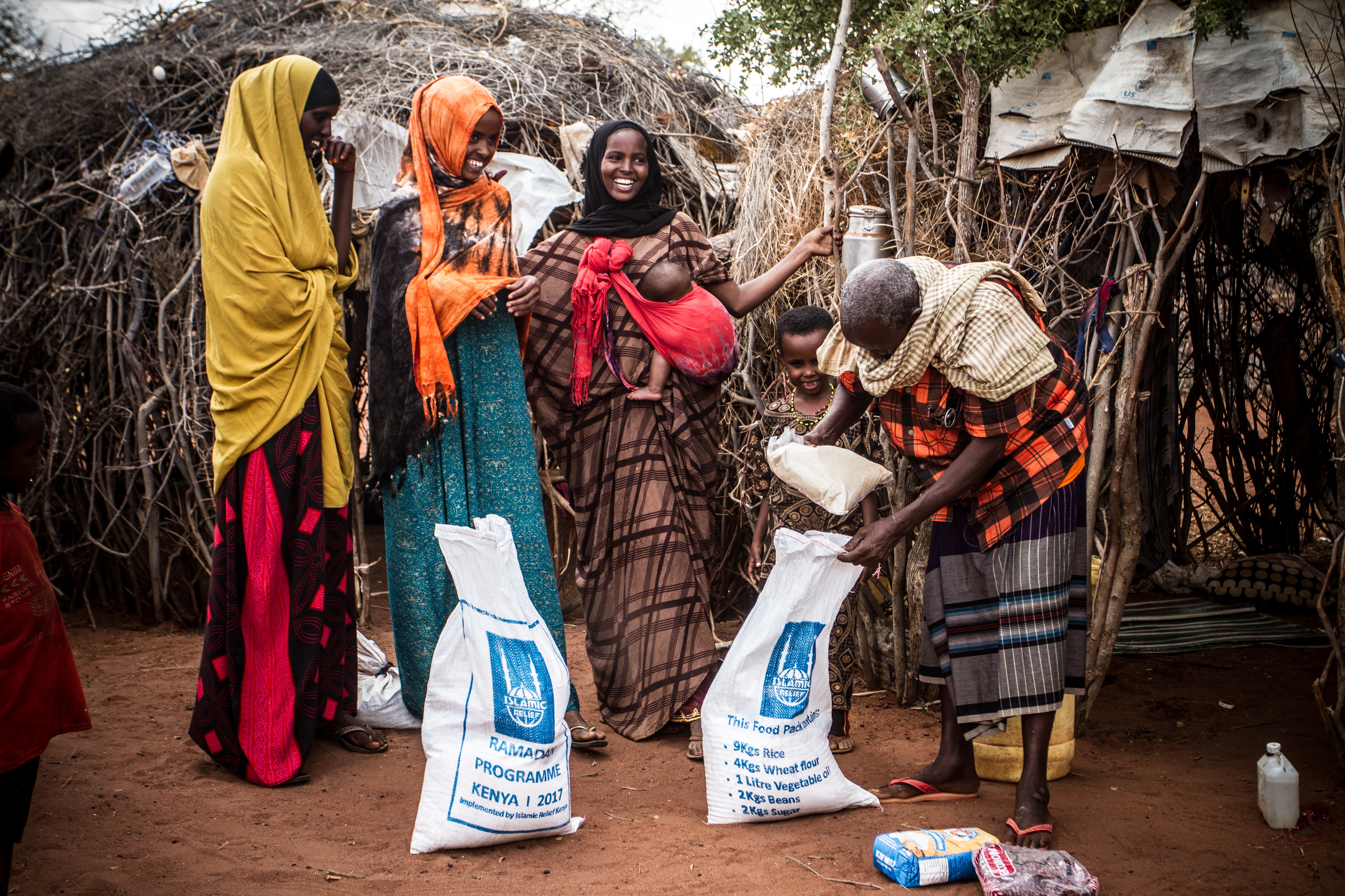women receiving aid food